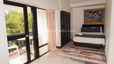 Casa de 5 alcobas en arriendo en Altos Del Poblado, Medellín, 1300 m² · foto 8 de 12