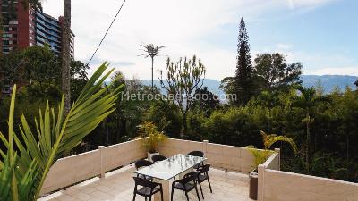 Casa de 5 alcobas en arriendo en Altos Del Poblado, Medellín, 1300 m² · foto 11 de 12