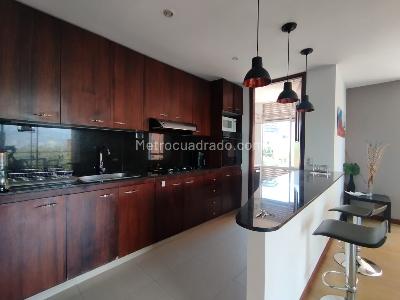 Apartamento de 2 alcobas en arriendo en El Poblado, Medellín, 97 m² · foto 6 de 12