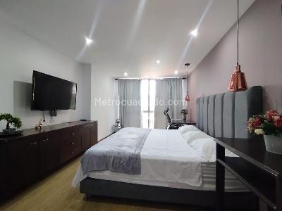 Apartamento de 2 alcobas en arriendo en El Poblado, Medellín, 97 m² · foto 8 de 12