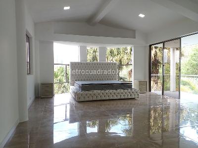 Casa de 4 alcobas en arriendo en El Poblado, Medellín, 400 m² · foto 11 de 19