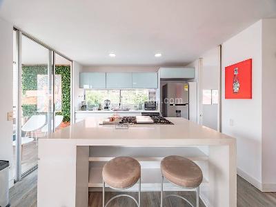 Apartamento de 2 alcobas en venta en El Poblado, Medellín, 140 m² · foto 5 de 15