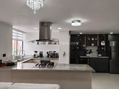 Apartamento de 2 alcobas en arriendo en El Poblado, Medellín, 102 m² · foto 6 de 19