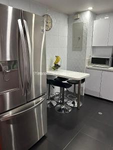 Apartamento de 3 alcobas en venta en Chico Navarra, Bogotá, 137 m² · foto 5 de 16
